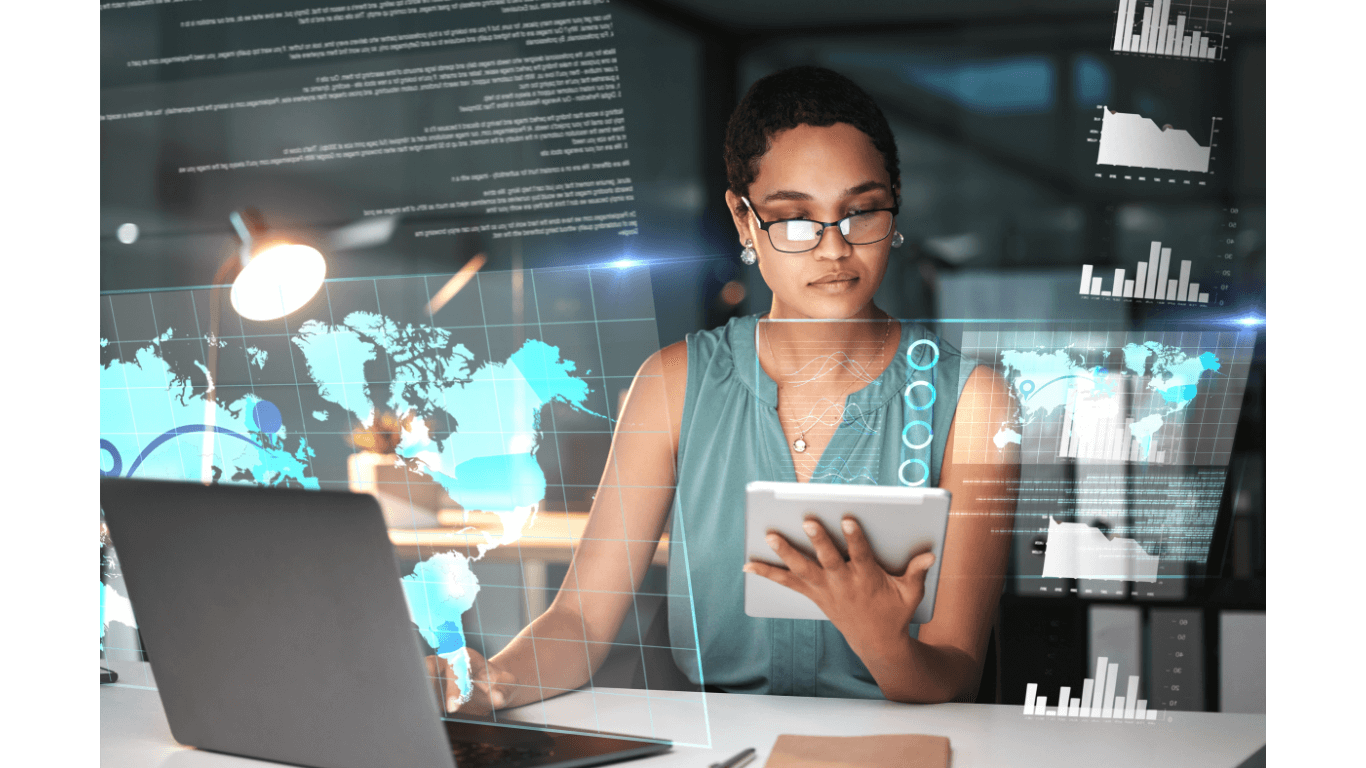 Lady holding a tablet in front of a laptop showing AI in modern web design technology
